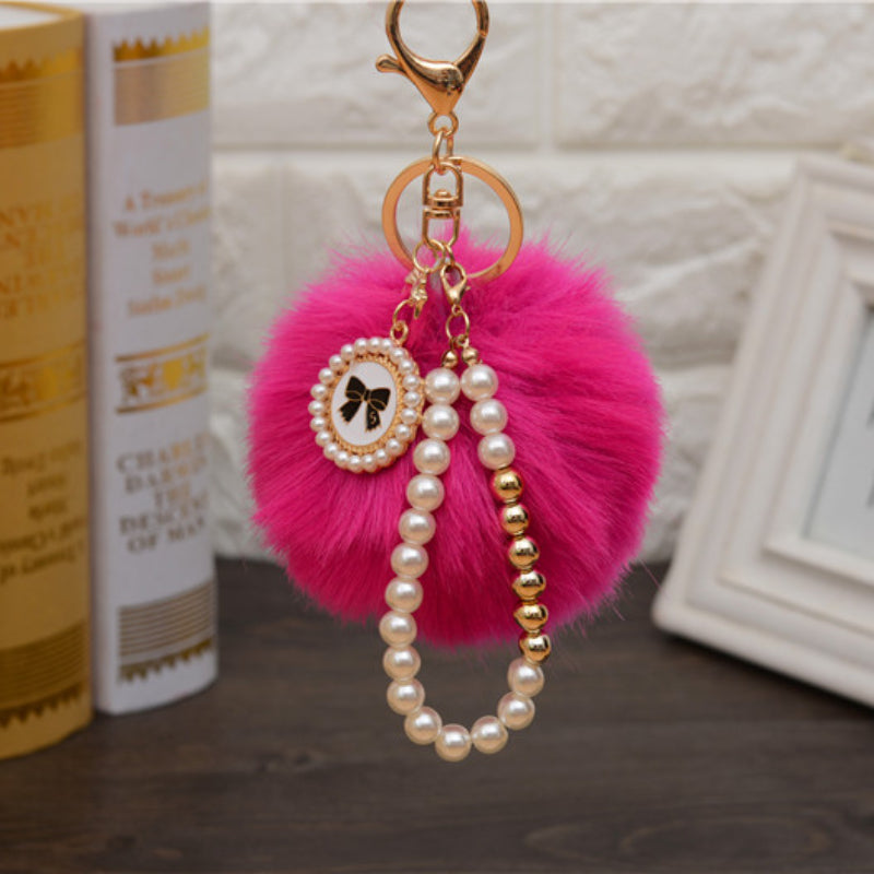 Carsine Fluff Ball Bow Pearl Chain Keychain Rose red