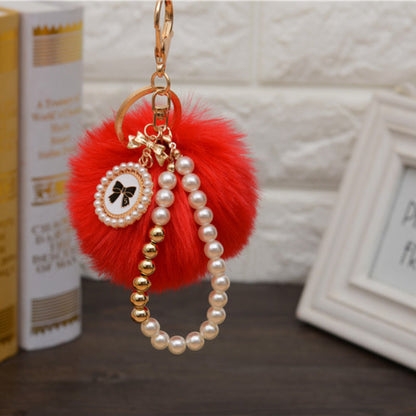Carsine Fluff Ball Bow Pearl Chain Keychain Red