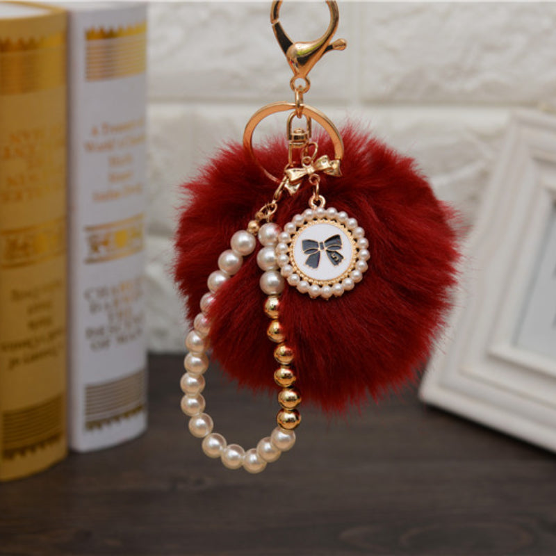 Carsine Fluff Ball Bow Pearl Chain Keychain Wine red