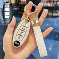 Carsine Golden Edge TPU key fob cover for Infiniti Q50 Q60 QX50 QX60 3/4-Button - angle view