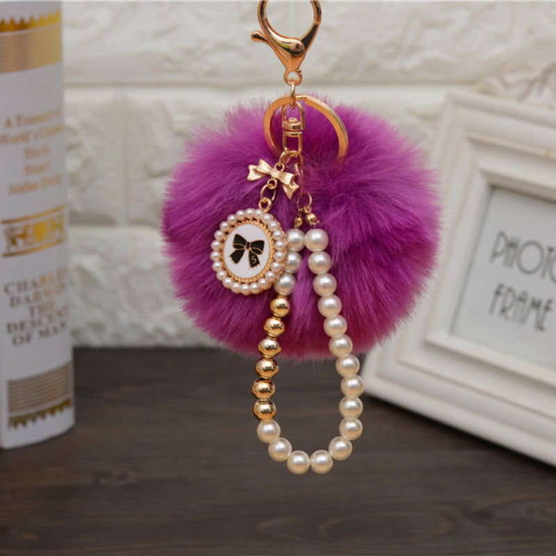 Carsine Fluff Ball Bow Pearl Chain Keychain Deep purple