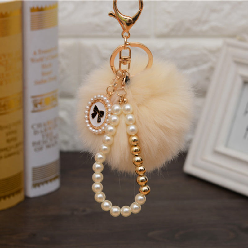 Carsine Fluff Ball Bow Pearl Chain Keychain Beige