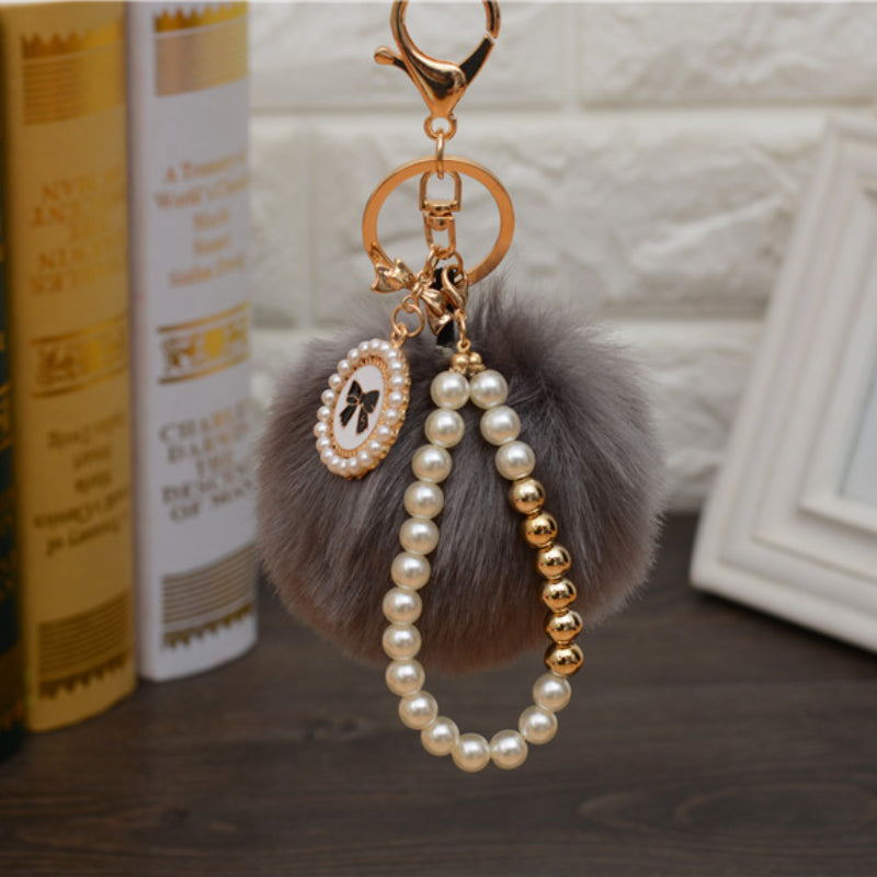 Carsine Fluff Ball Bow Pearl Chain Keychain Grey