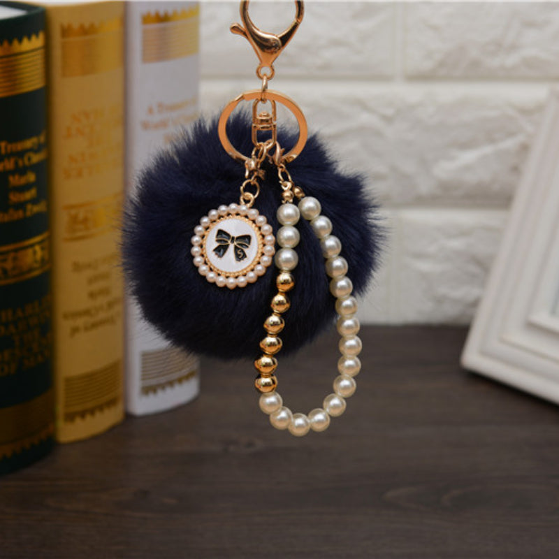 Carsine Fluff Ball Bow Pearl Chain Keychain Navy blue