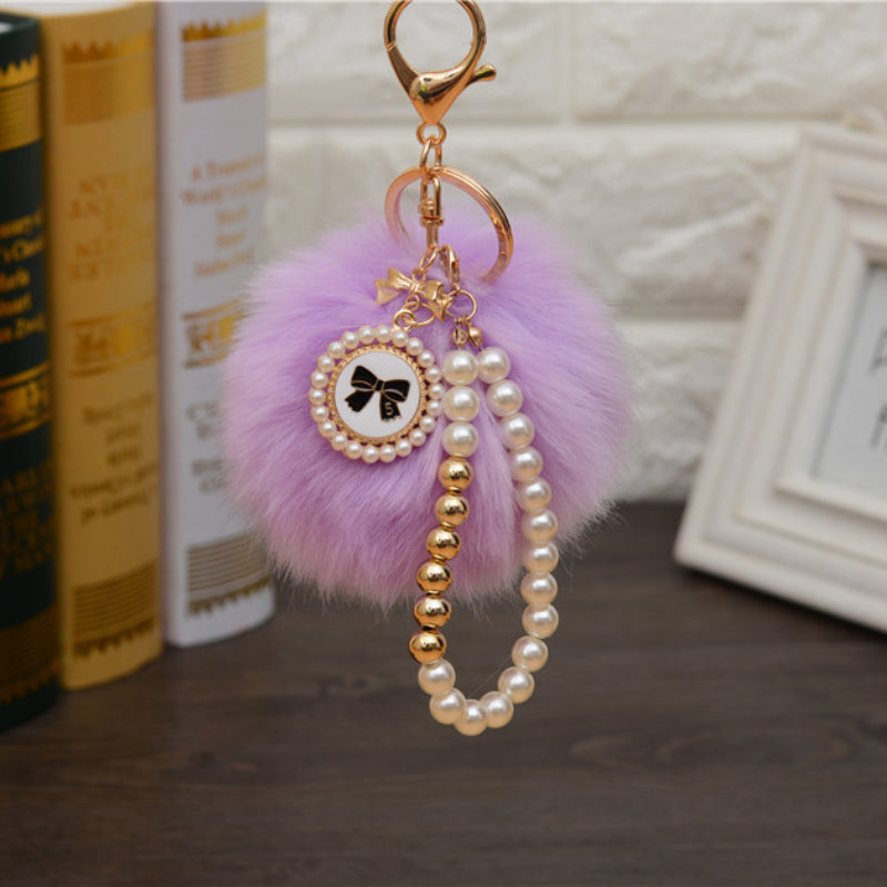 Carsine Fluff Ball Bow Pearl Chain Keychain Light purple